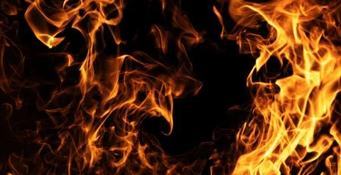 Fire glowing flame texture. Fire powerful heat movement. Fire burning abstrac Stock Photos