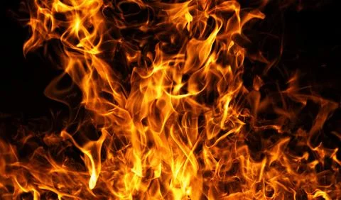 Fire glowing flame texture. Fire powerful heat movement. Fire burning abstrac Stock Photos
