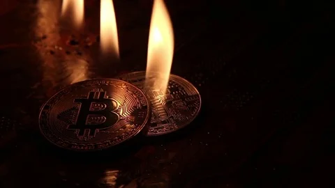 The fire is on the gold and silver bitcoins like a candle. Vidéo 80136848