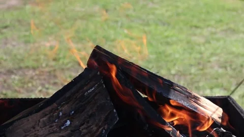 Fire in the grill close-up, close-up, close up bonfire flames of camping fire, Stock Footage 233155983