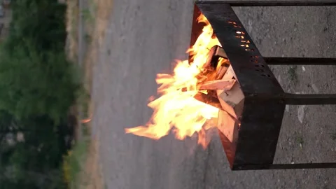 Fire in the grill close up Video stock 283435398