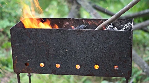 Fire in the grill  Stock Footage 37543339