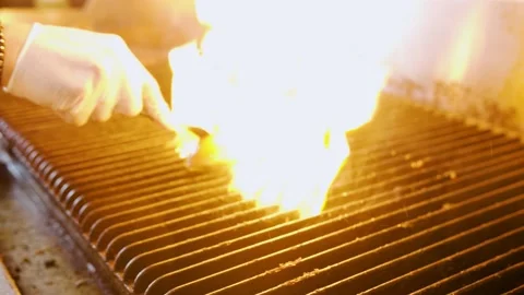 Fire on the grill Stock Footage 153720351