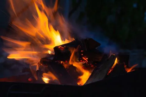 Fire in the grill at night close-up, fire flame Stock Photos