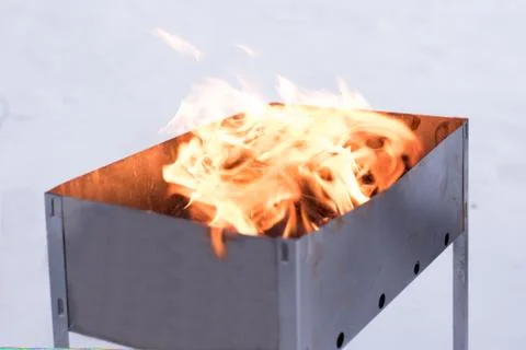 The fire in the grill Stock Photos