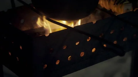 Fire in the grill on which food is cooked Stock Footage 265083792