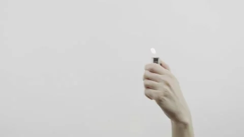 Fire hand lighter Stock Footage 153033990