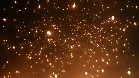 FIre-Heated Paper Lanterns Float Into the Sky Stock Footage 289565975