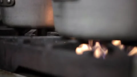 Fire heating a pan Stock-Footage 307340015