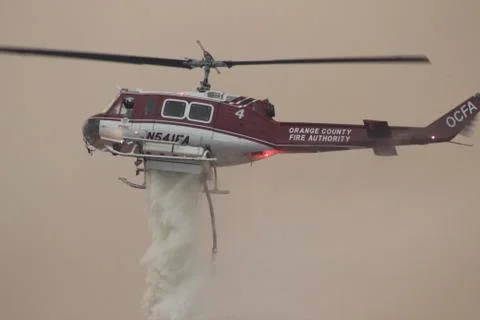 Fire Helicopter Dropping Water Stock Photos