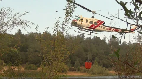 Fire Helicopter to the rescue Stock Footage 27470778