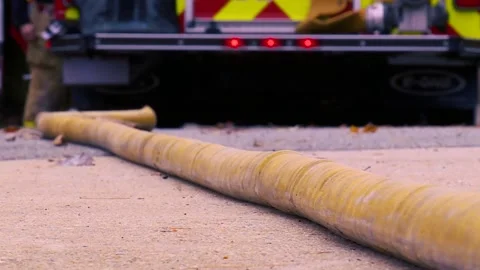 Fire Hose Charging Slow-mo Video stock 143880441