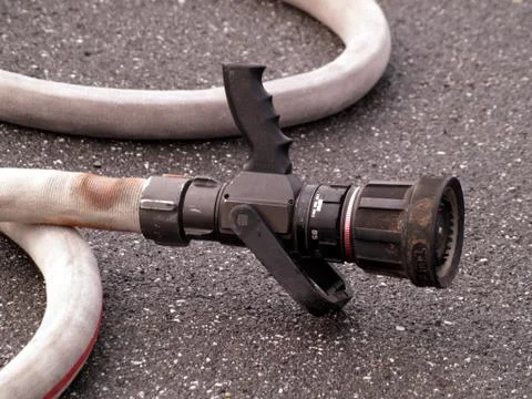 Fire hose Stock Photos