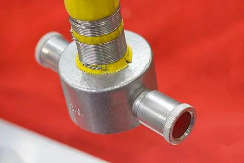 Fire hose with red background Stock Photos