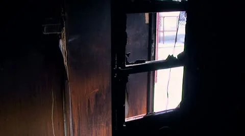 Fire in the house. Black burnt walls in the interior of the house after the fire Stock Footage 10802445