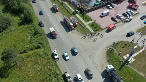 Fire in the house, fire trucks on fire in summer time. 4K footage from drone Video stock 113111880