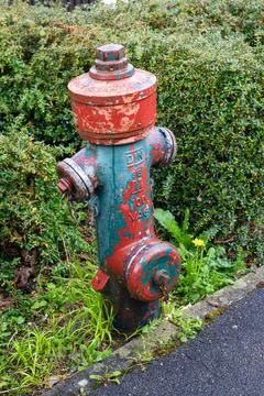 Fire hydrant along the side of the road Stock Photos