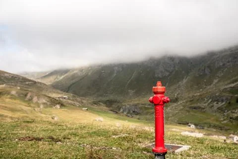 Fire hydrant in alpine scene Stock Photos