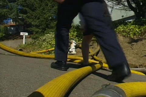 Fire hydrant and hoses Stock Footage 492127