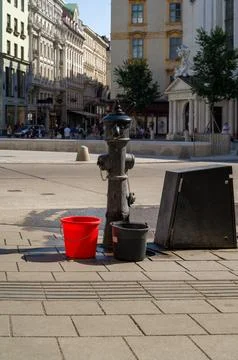 Fire hydrant and two buckets. Stock Photos