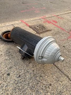 Fire Hydrant Broken Knocked Over on Ground Stock Photos