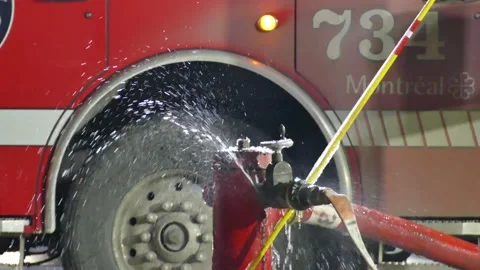 Fire hydrant intensivly leaking at night Stock Footage 139663900