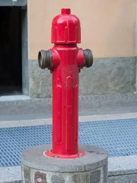 Fire hydrant or fireplug  connection for firefighters in public road Stock Photos