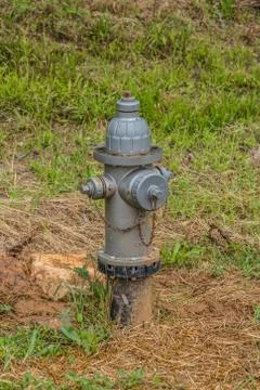 Fire hydrant outdoors in grass Stock Photos