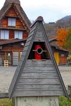 Fire hydrant pipe with gassho-style foof top in Shirakawa Stock Photos