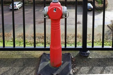 Fire hydrant on platform at train station Nieuwerkerk aan den IJssel Stock Photos