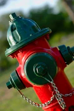 Fire hydrant - red and green Stock Photos