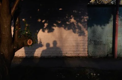 A fire hydrant on the side of a building Stock Photos