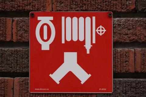 A fire hydrant sign Stock Photos
