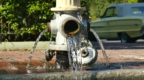 Fire Hydrant spilling water Stock Footage 44425996