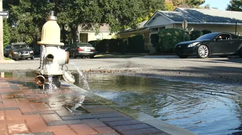 Fire Hydrant spilling water Stock Footage 46673128