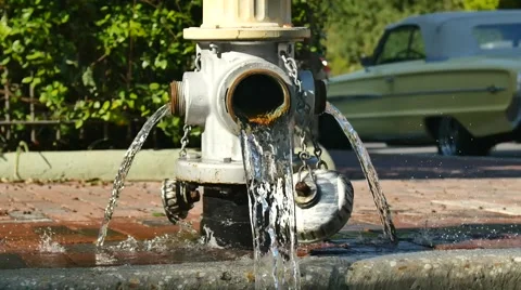 Fire Hydrant spilling water Stock Footage 46673129