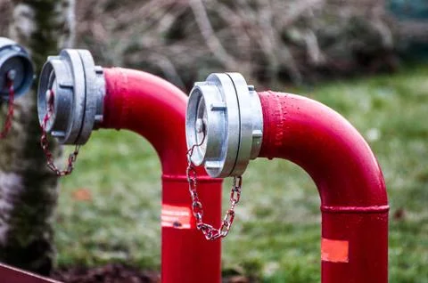 Fire hydrant on the street Stock Photos