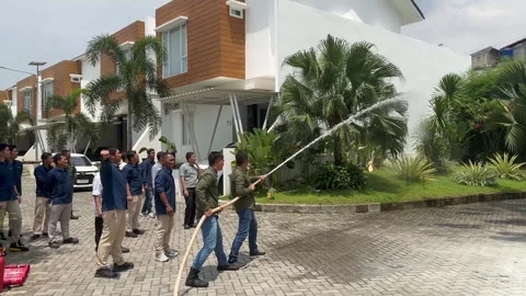 Fire hydrant training in the sunny day at jakarta Stock Footage 290814881