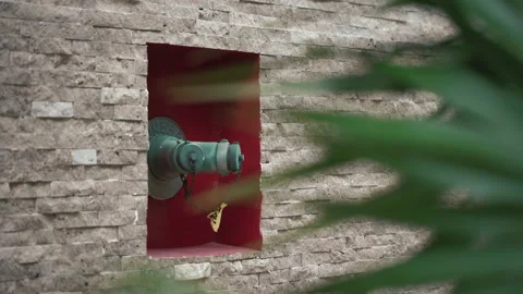 Fire hydrant in the wall of a building. fire safety of city streets Stock Footage 170507304