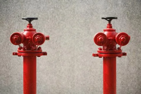 Fire hydrants side by side Stock Photos