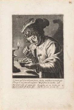 Fire; Ignis; Four elements. A young man with a hat puts his pipe with fire... Stock Photos