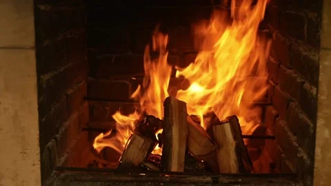 Fire, igniting a fire. Flames in the fireplace, wood for cooking meat. Brick Stock Footage 156598889