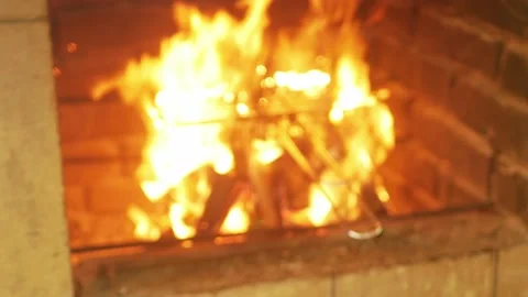 Fire, igniting a fire. Flames in the fireplace, wood for cooking meat. Brick Stock Footage 156599251