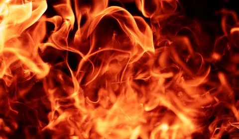 Fire inferno. Fire flame texture. Fire sparks. Fire effect. Stock Photos
