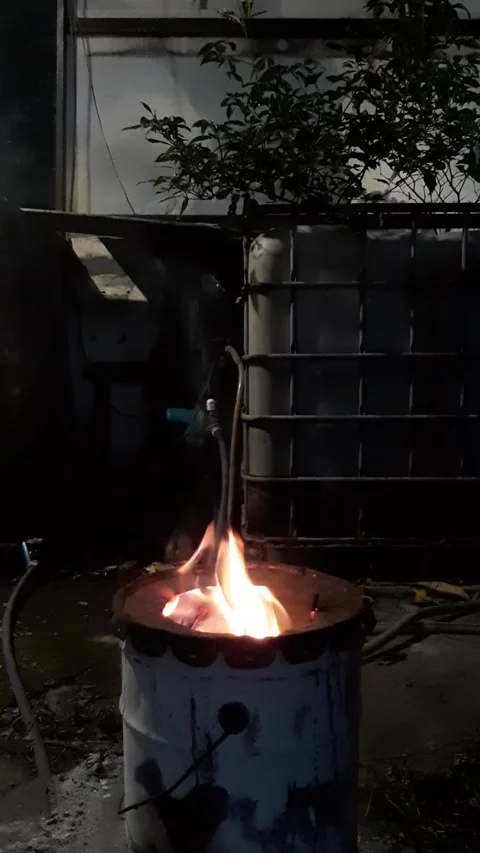 Fire inside Barrel, Vertical Footage Video stock 340110089