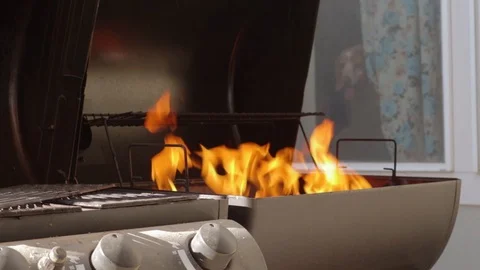 Fire inside a grill Stock Footage 90640887