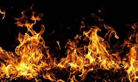 Fire intense blaze motion. Fire hot flame texture. Fire dramatic glowing he.. Stock Photos