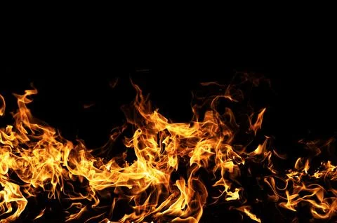 Fire intense flame movement. Fire burning abstract shape. Fire dramatic heat  Stock Photos