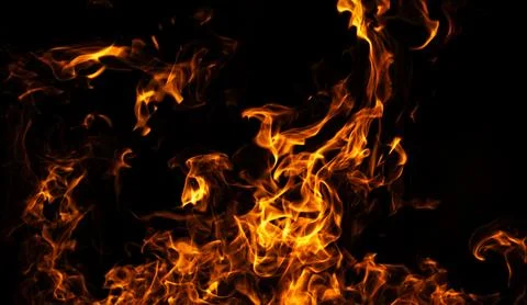 Fire intense flame movement. Fire burning abstract shape. Fire dramatic heat  Stock Photos