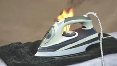 Faulty home appliance is burn, an iron f, Stock Video